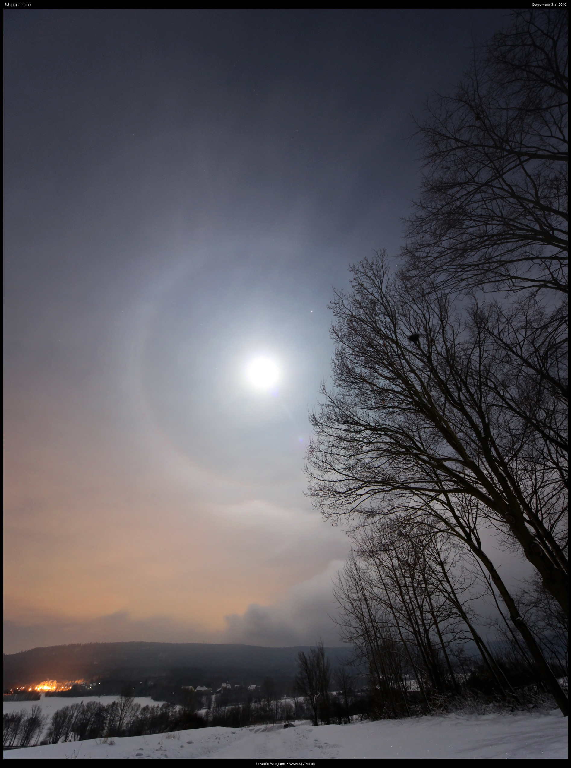 Mondhalo ber dem winterlichen Taunus