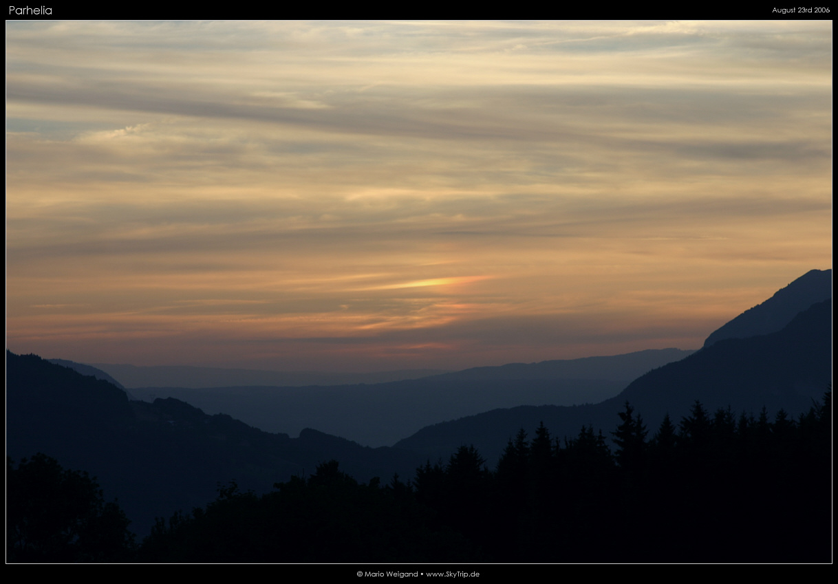 Nebensonne mit Bergkulisse