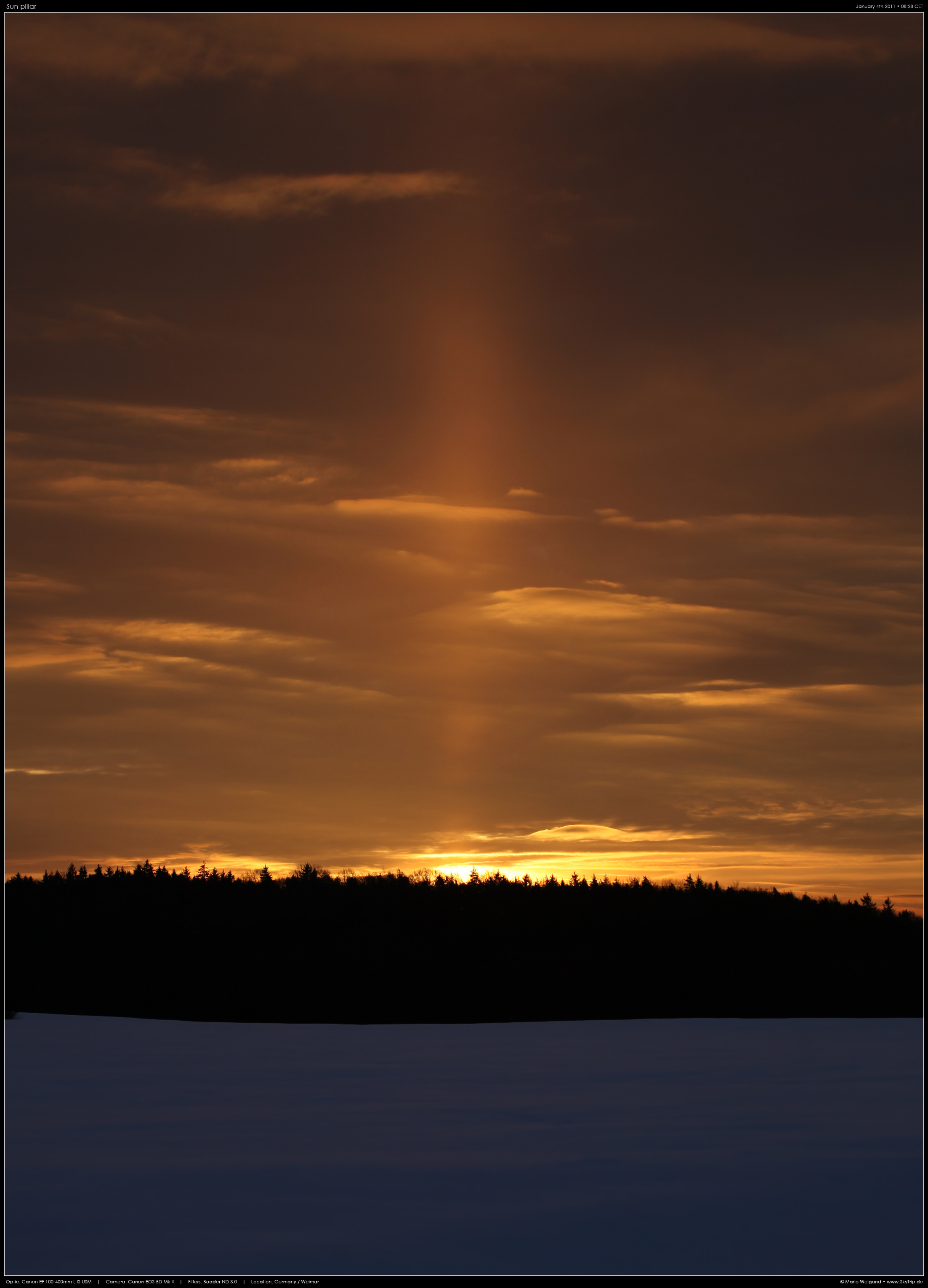 Lichtsule vor Sonnenaufgang