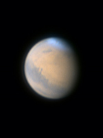 Der rote Planet Mars mit Wolken ber dem Nordpol
